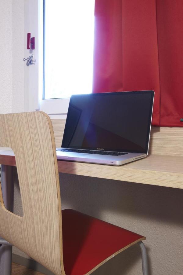 Chambre Triple (1 Lit Double et 1 Lit Simple)
