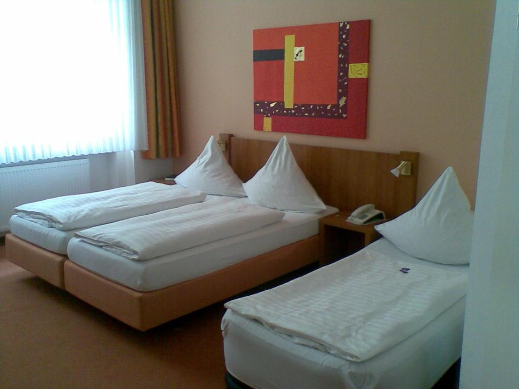 Dreibettzimmer