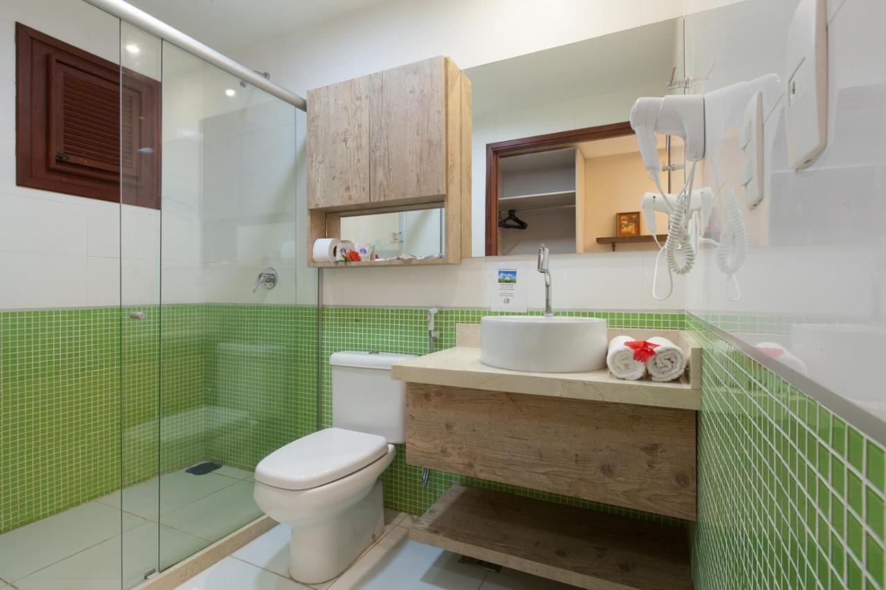 Quarto Triplo Deluxe com Varanda