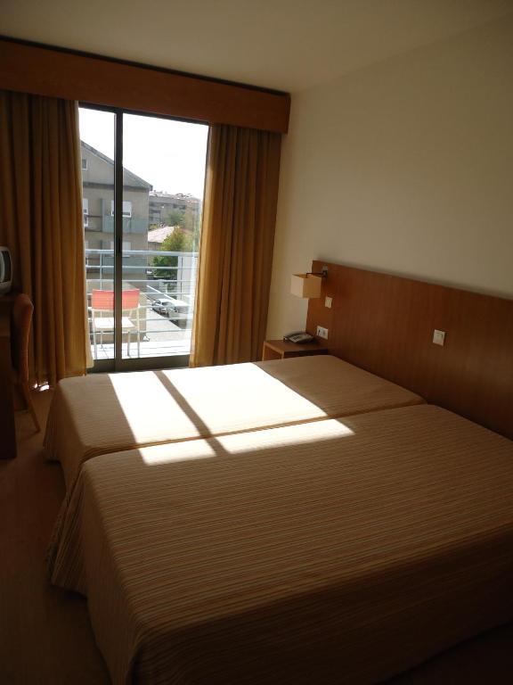 Quarto Twin com Varanda