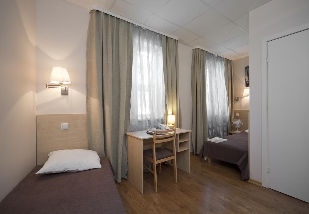 Tweepersoonskamer met 2 Aparte Bedden