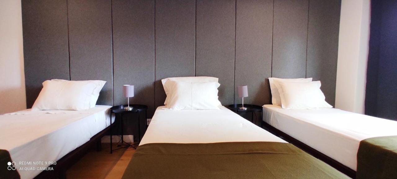 Quarto Triplo com Varanda