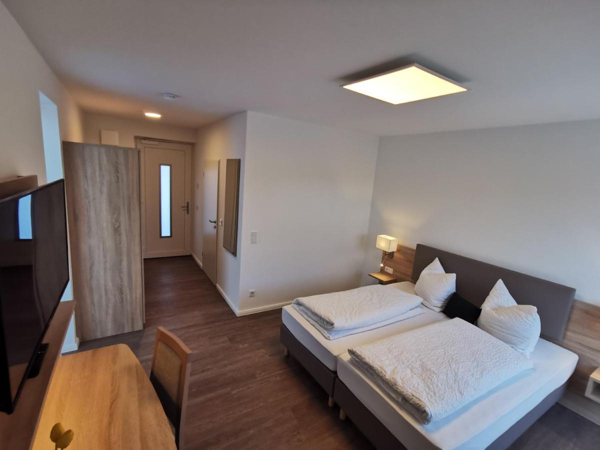 Doppel- oder Zweibettzimmer