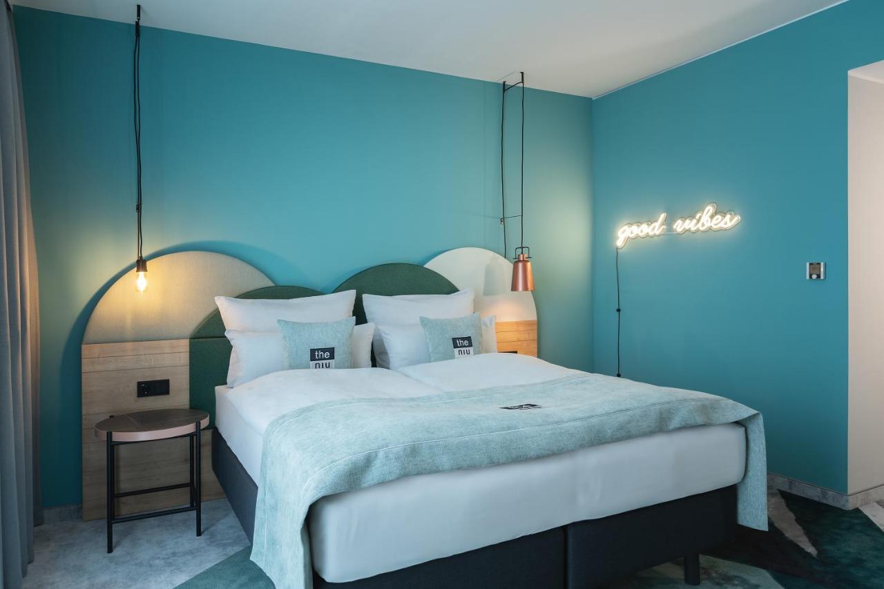 Premium Zimmer mit Queensize-Bett und Küchenzeile