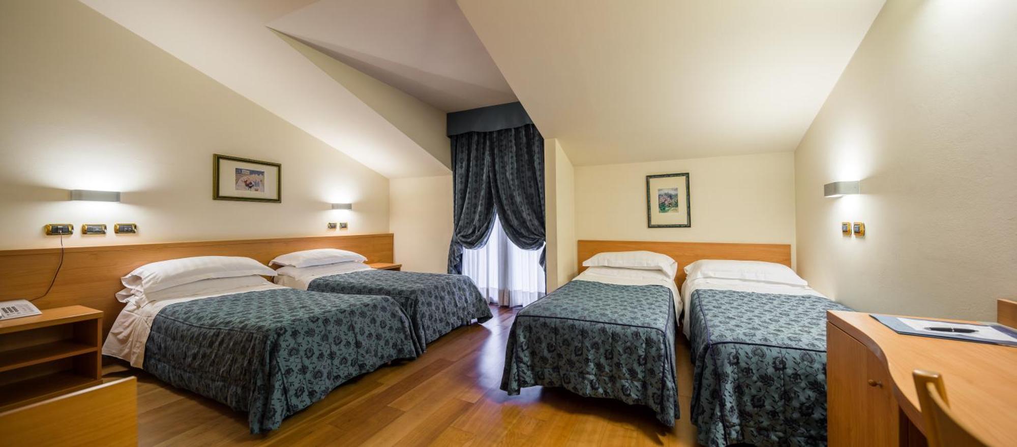 Familiekamer (2 Volwassenen + 2 Kinderen)