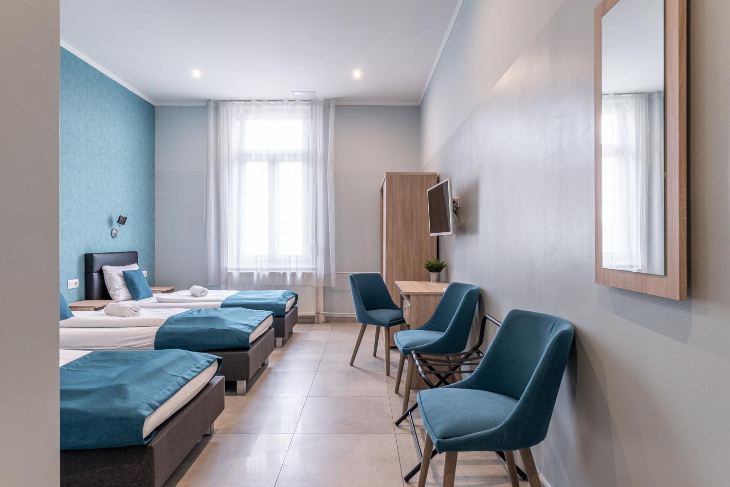Quarto Duplo com Cama Extra (3 Adultos)
