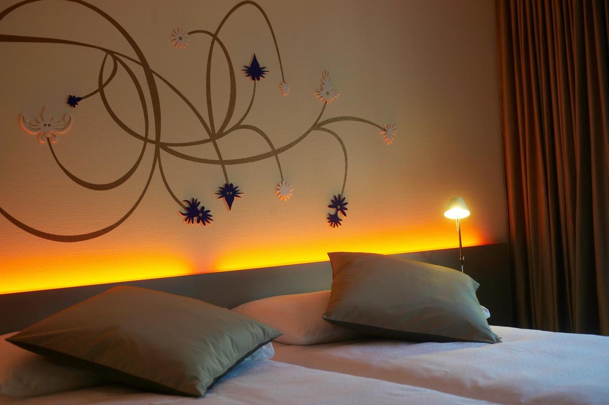 DESIGN Tweepersoonskamer met 2 Aparte Bedden