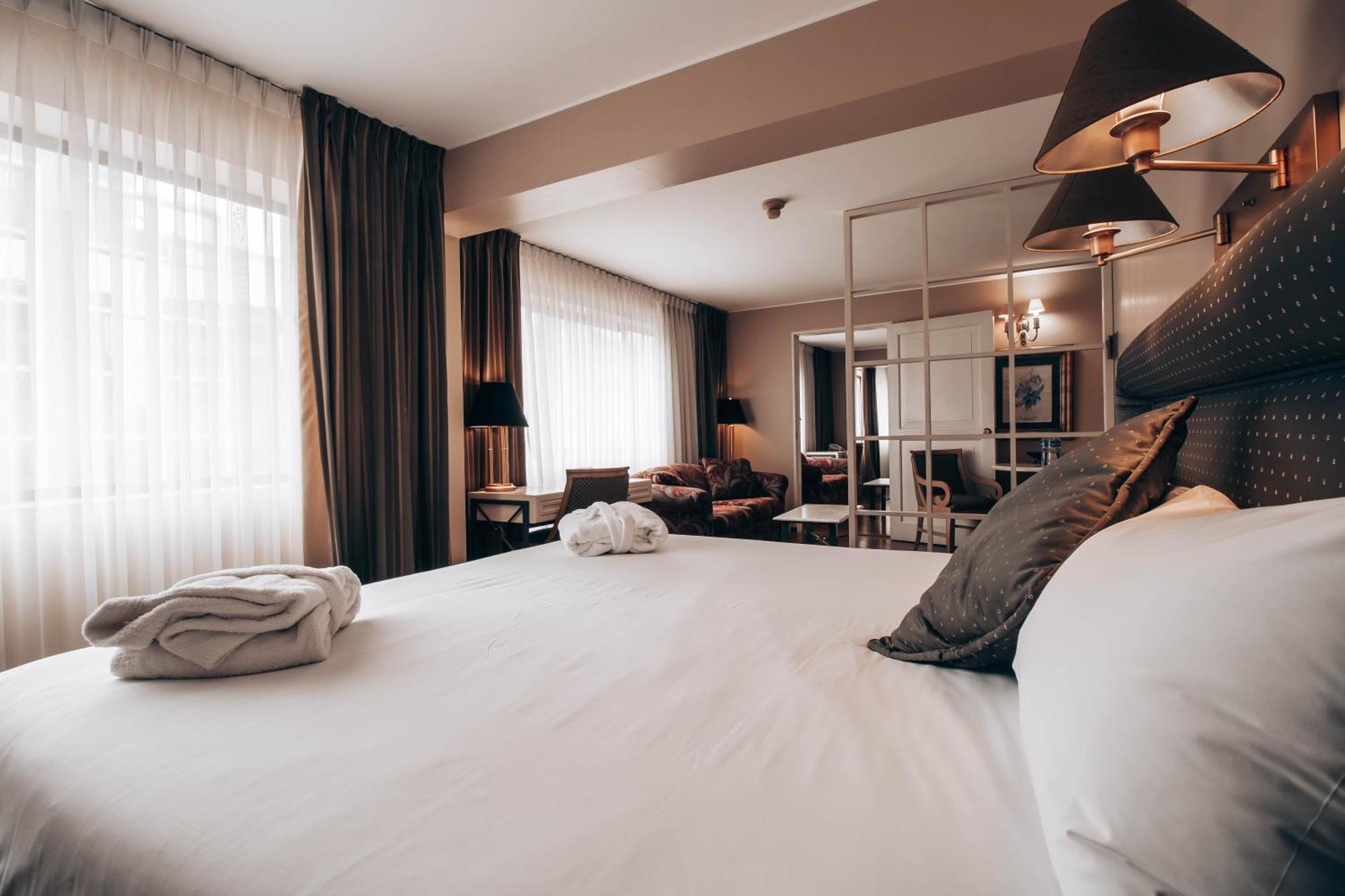 Suite Executive con cama extragrande y zona de cocina