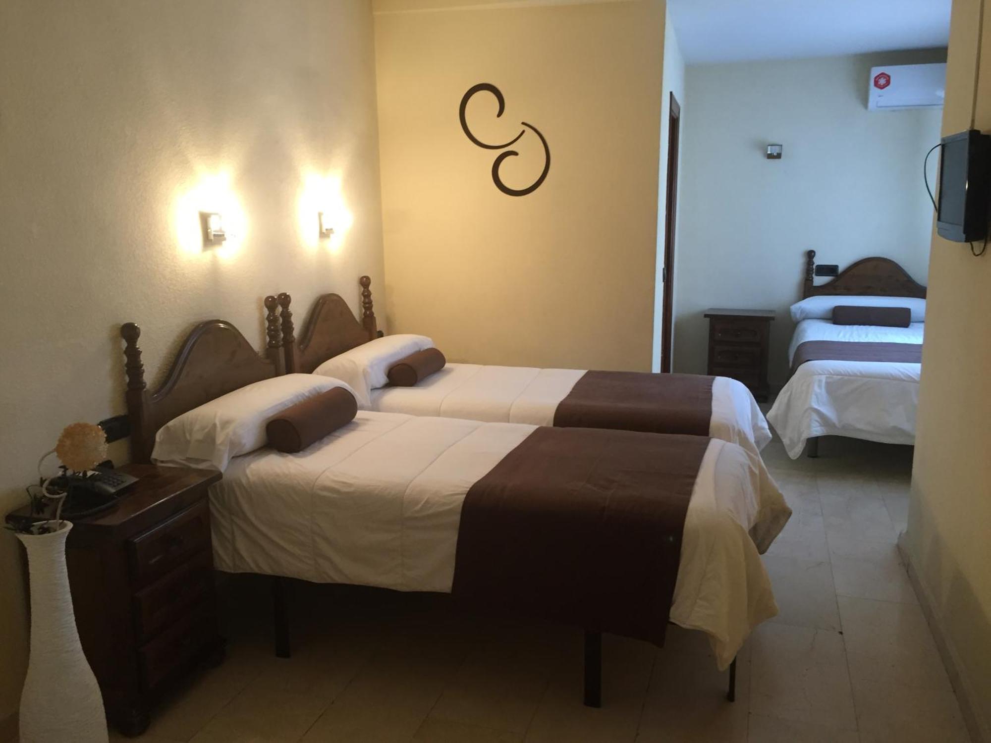 Quarto Duplo com Cama Extra