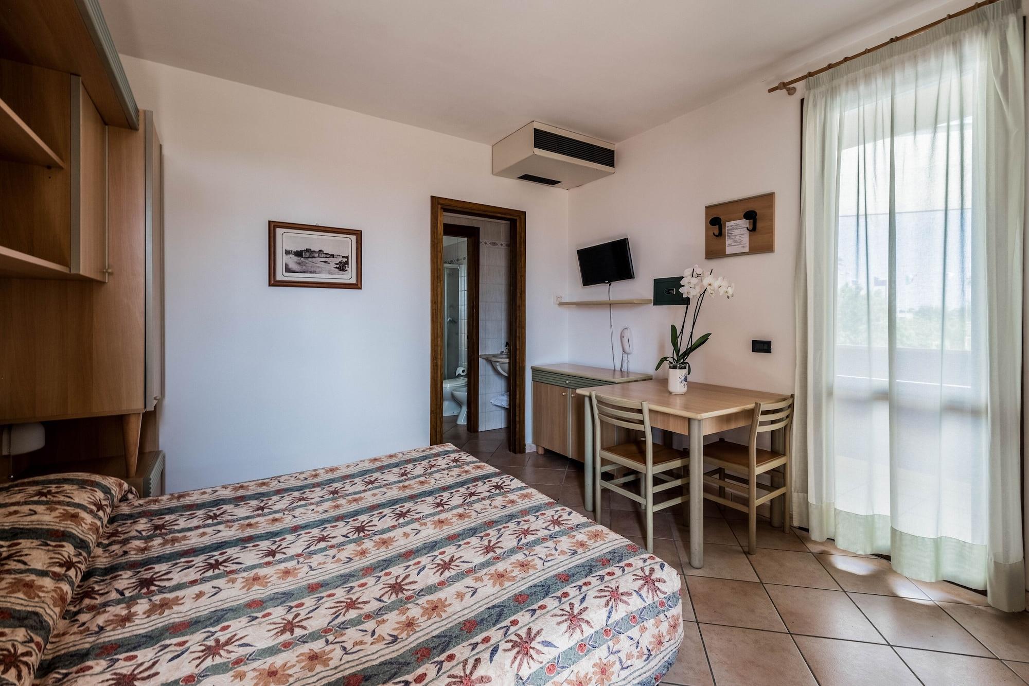 Superior Kamer met een tweepersoonsbed en een slaapbank