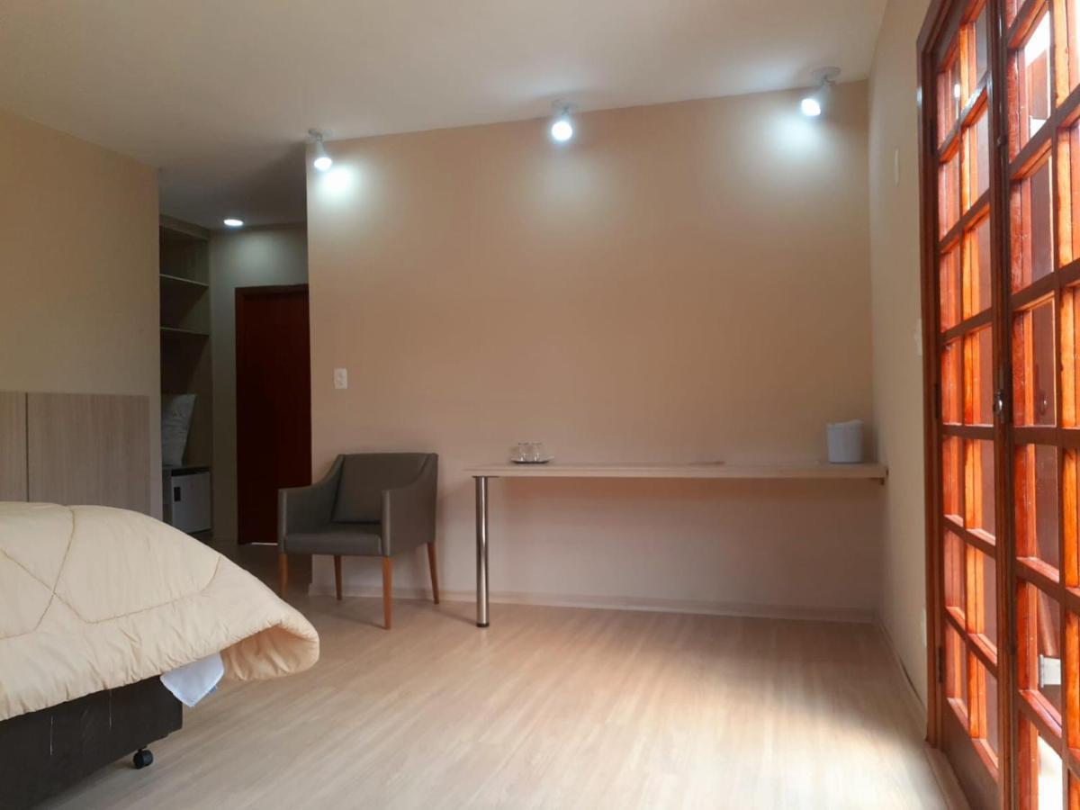 Quarto com Cama Queen-Size e Varanda