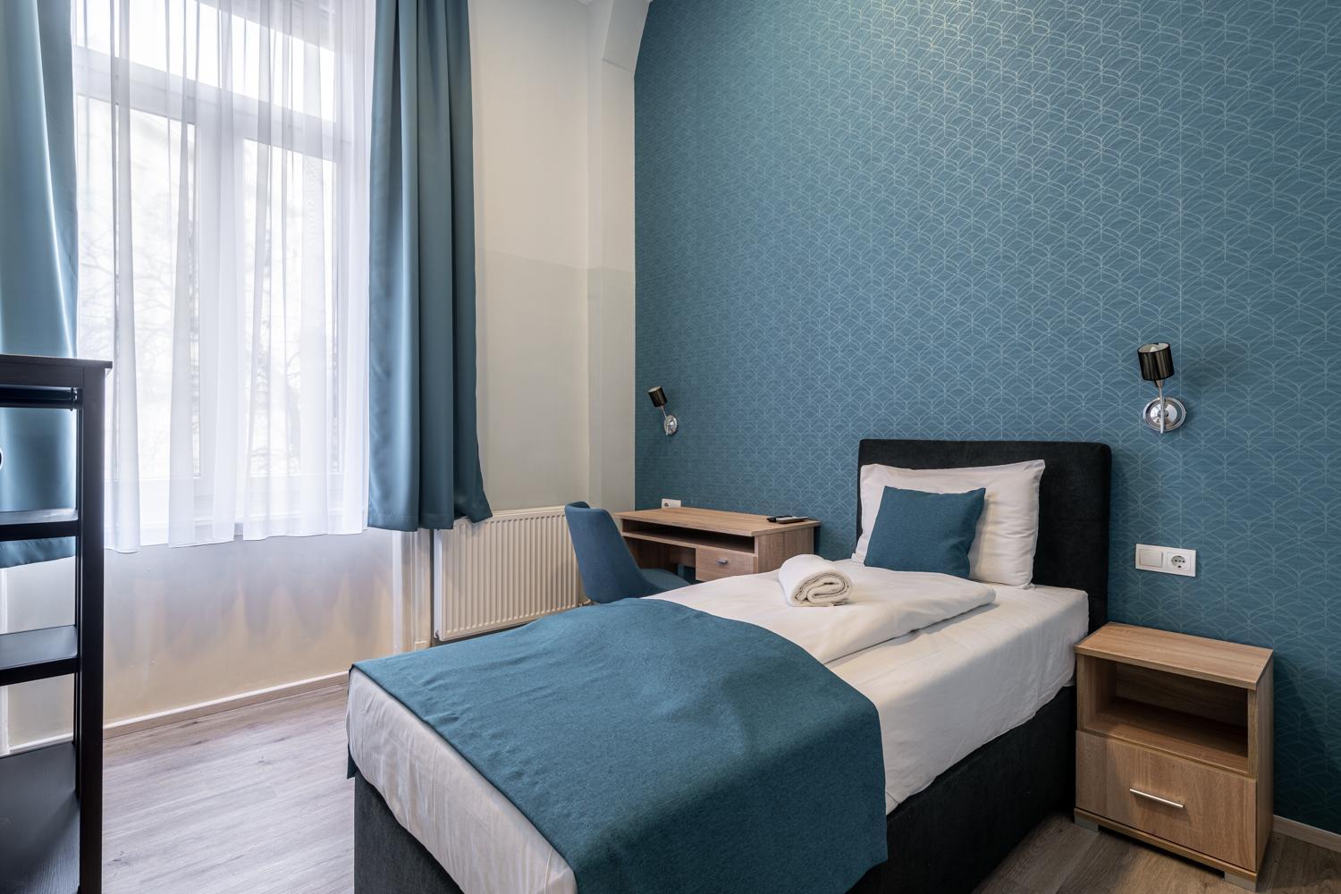 Quarto Individual com Banheiro