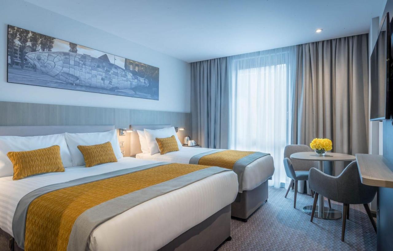 Deluxe Kamer met Tweepersoonsbed en Eenpersoonsbed - Uitzicht op Zee