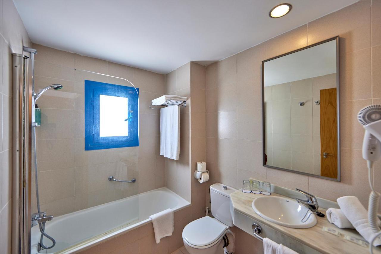 Habitación Cuádruple (2 adultos + 2 niños)