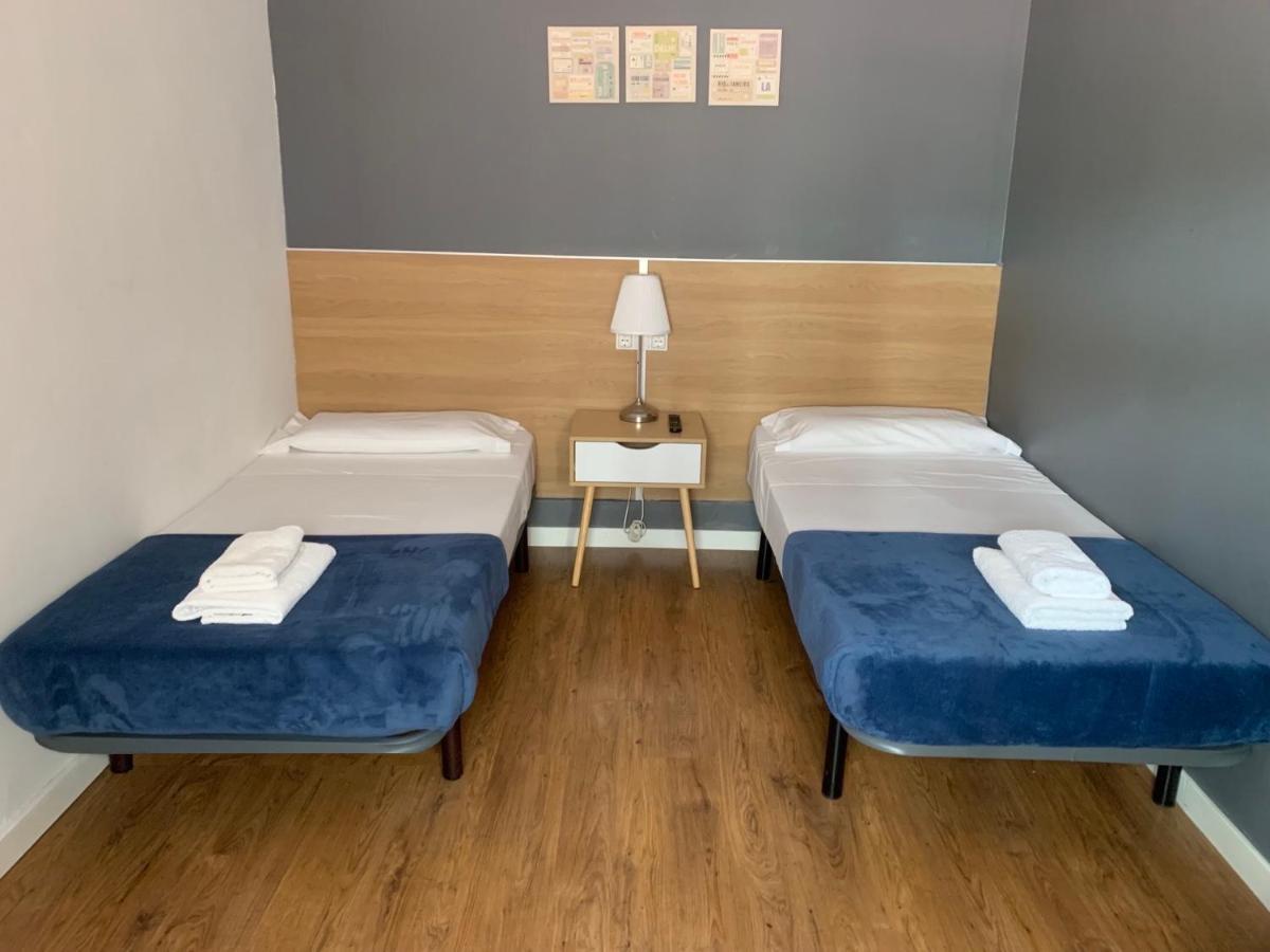 Quarto Twin com Casa de Banho Partilhada