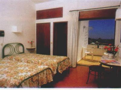 Quarto com 2 Camas de Solteiro