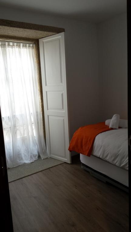 Quarto Individual com Casa de Banho Partilhada