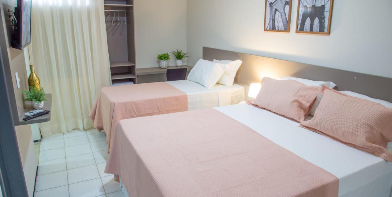 Quarto Triplo com Banheiro Privativo