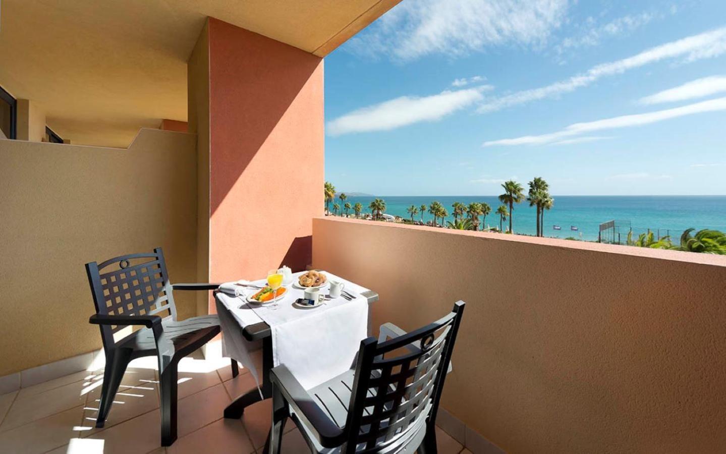 Habitación Doble Superior con vistas al mar (2 adultos + 1 niño)