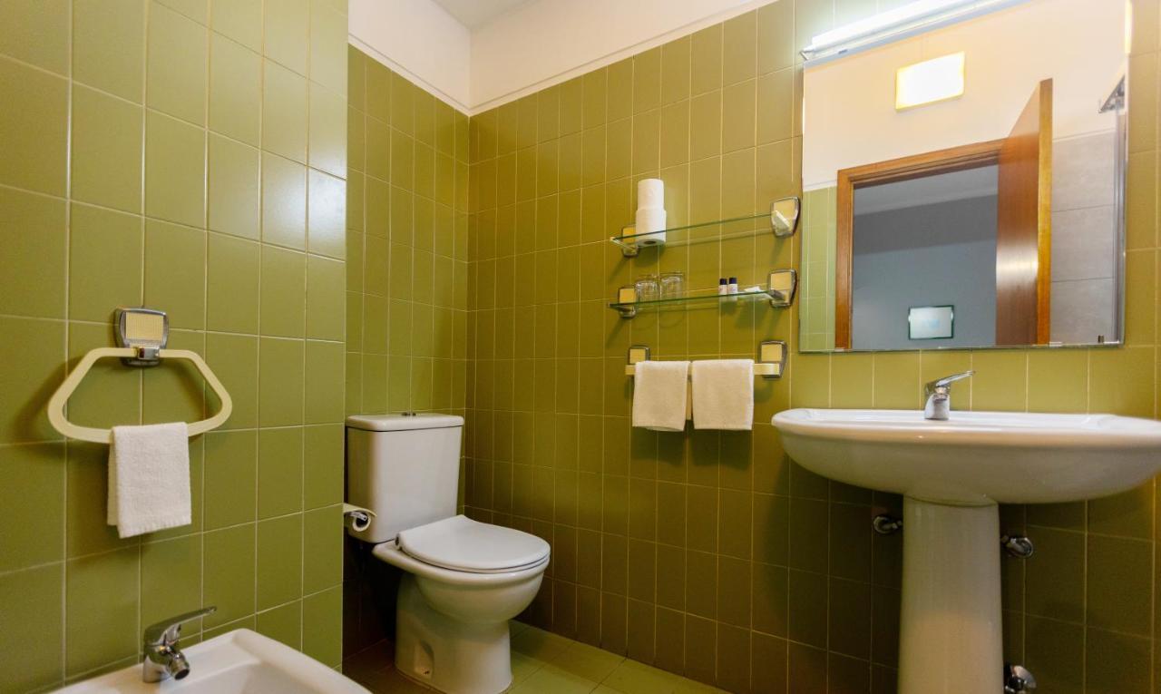 Quarto Triplo com Varanda