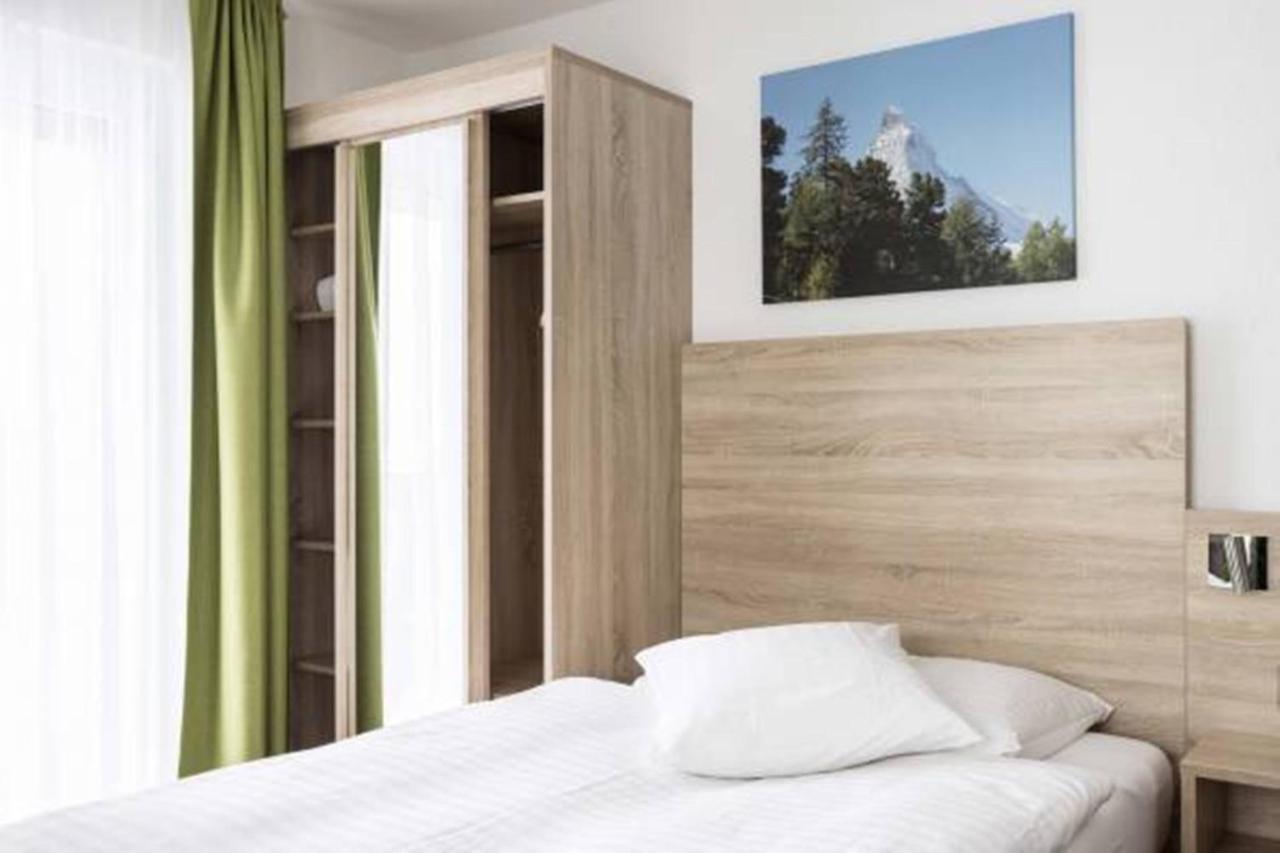 Camera Singola con Letto Ampio e Vista Montagna