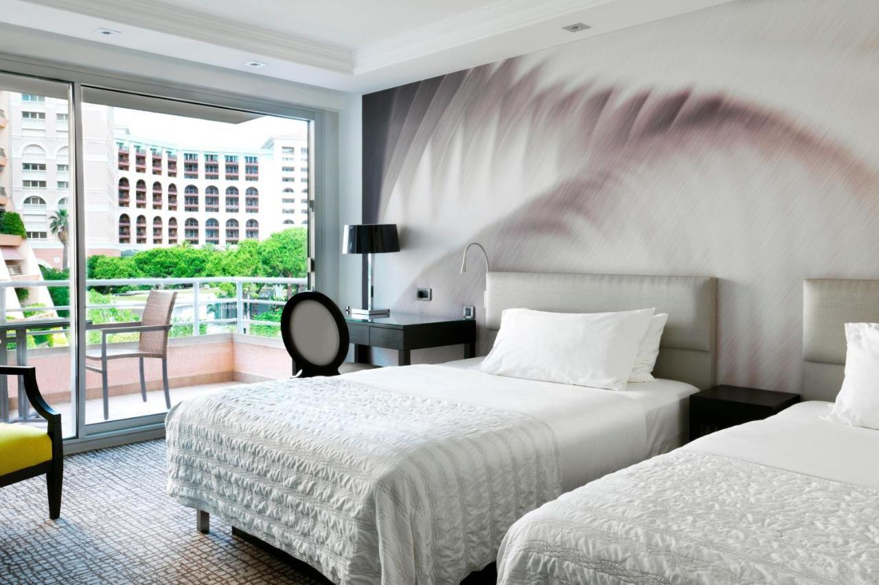 Classic Zimmer mit 2 Doppelbetten und Stadtblick