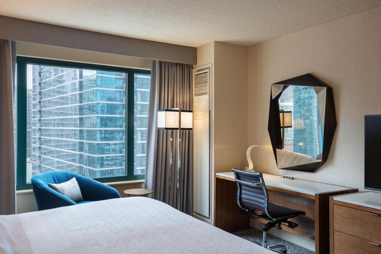 Quarto VIP com Cama King-size e Vista da Cidade - Andar Alto