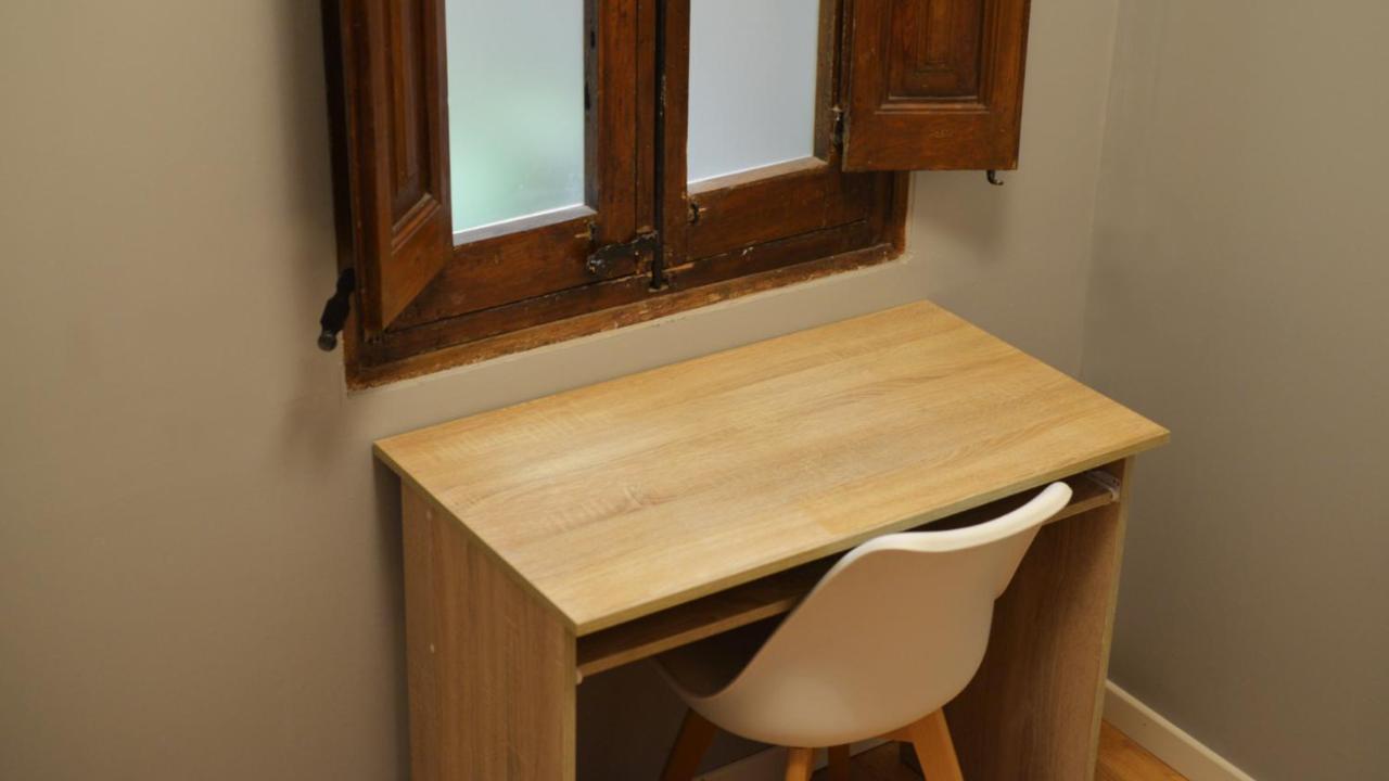 Quarto Individual com Casa de Banho Partilhada