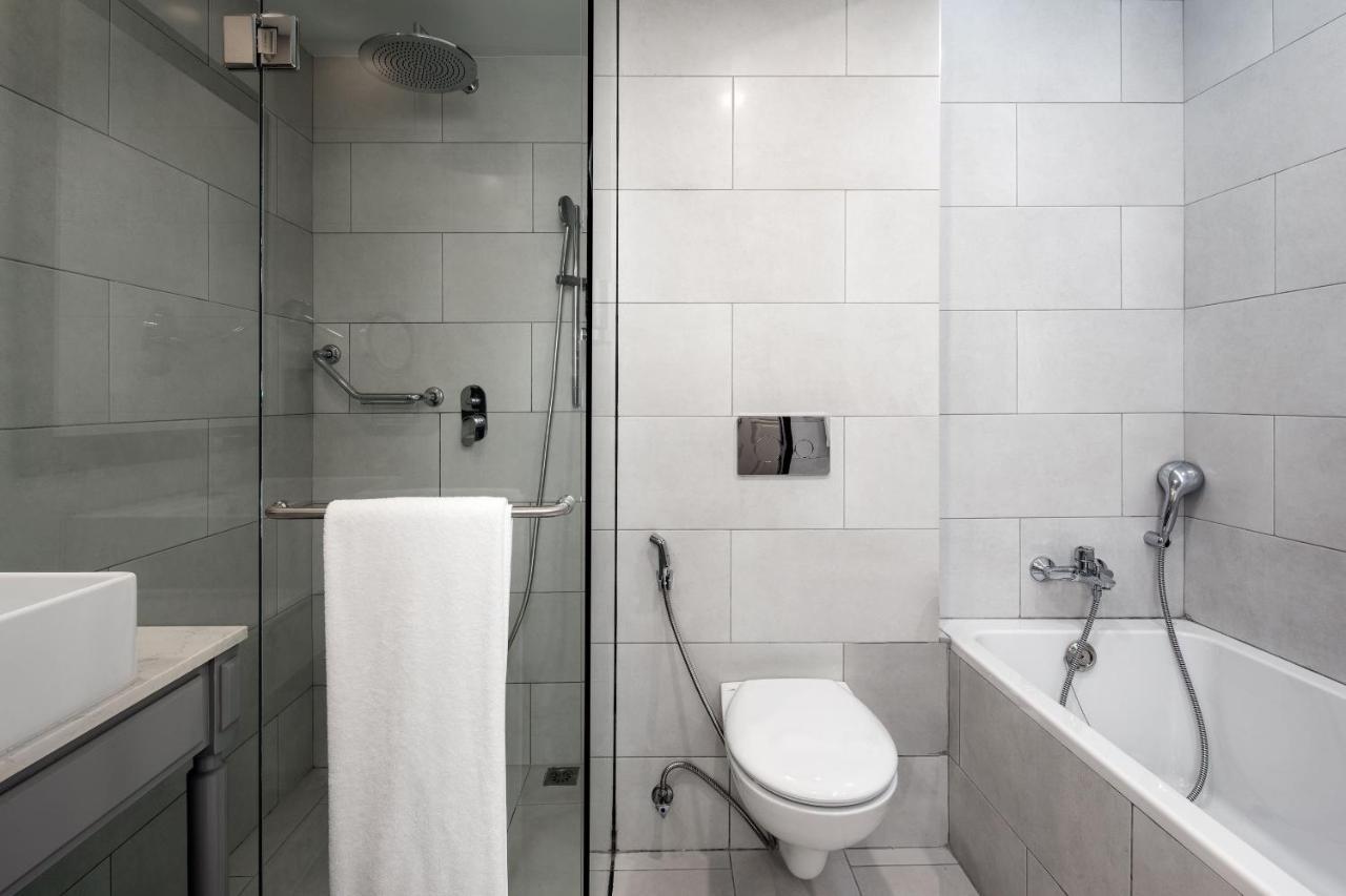 Premium Deluxe King Room with Balcony and Pool View