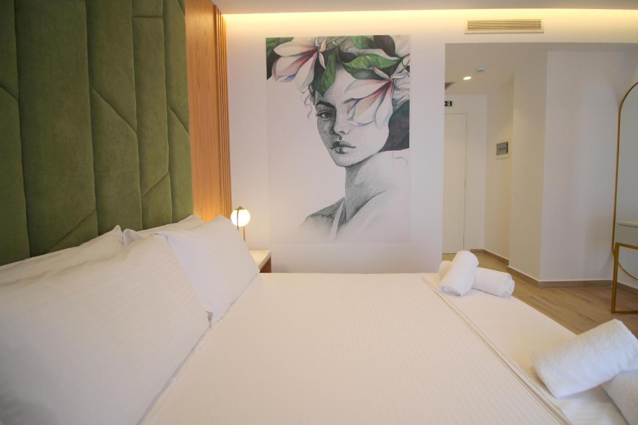 Deluxe tweepersoonskamer met balkon en uitzicht op zee