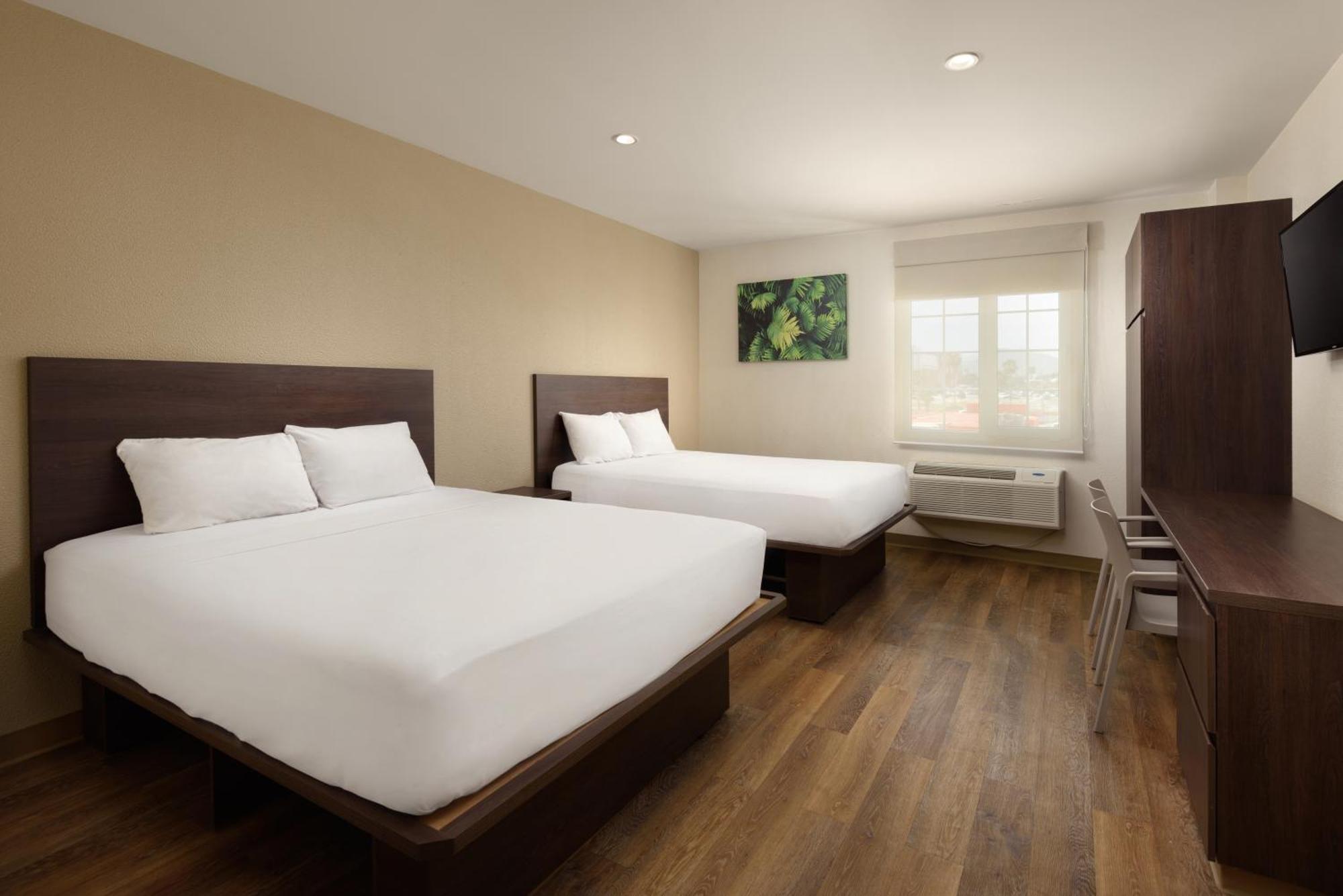 Suite two queen beds,1304985724:JPEG