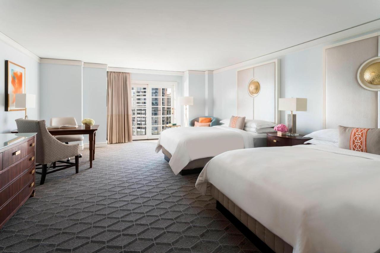 Large Room with Two double Beds and Partial Water View,1608296757:JPEG