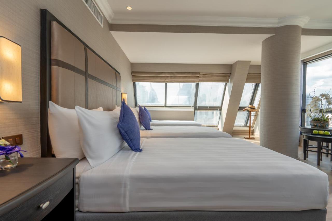 Eckdreibettzimmer