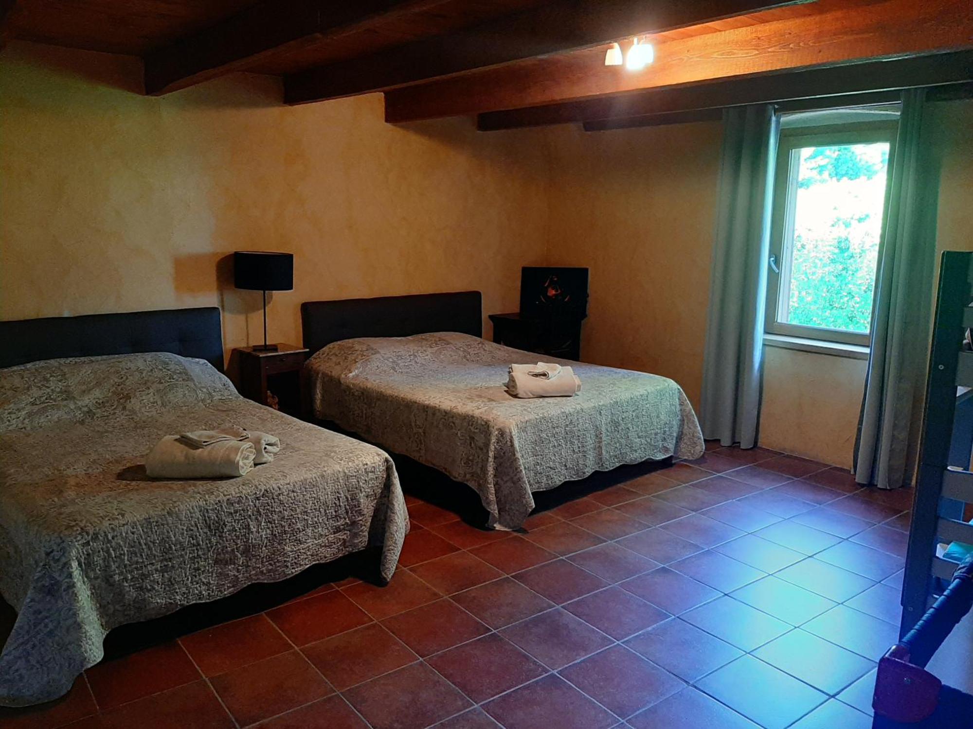 Chambre Quadruple avec Salle de Bains Privative