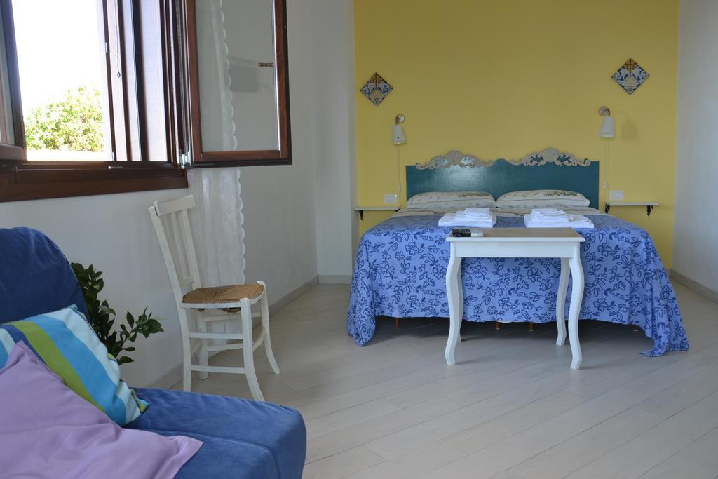 Camera Matrimoniale Deluxe (2 Adulti + 1 Bambino)
