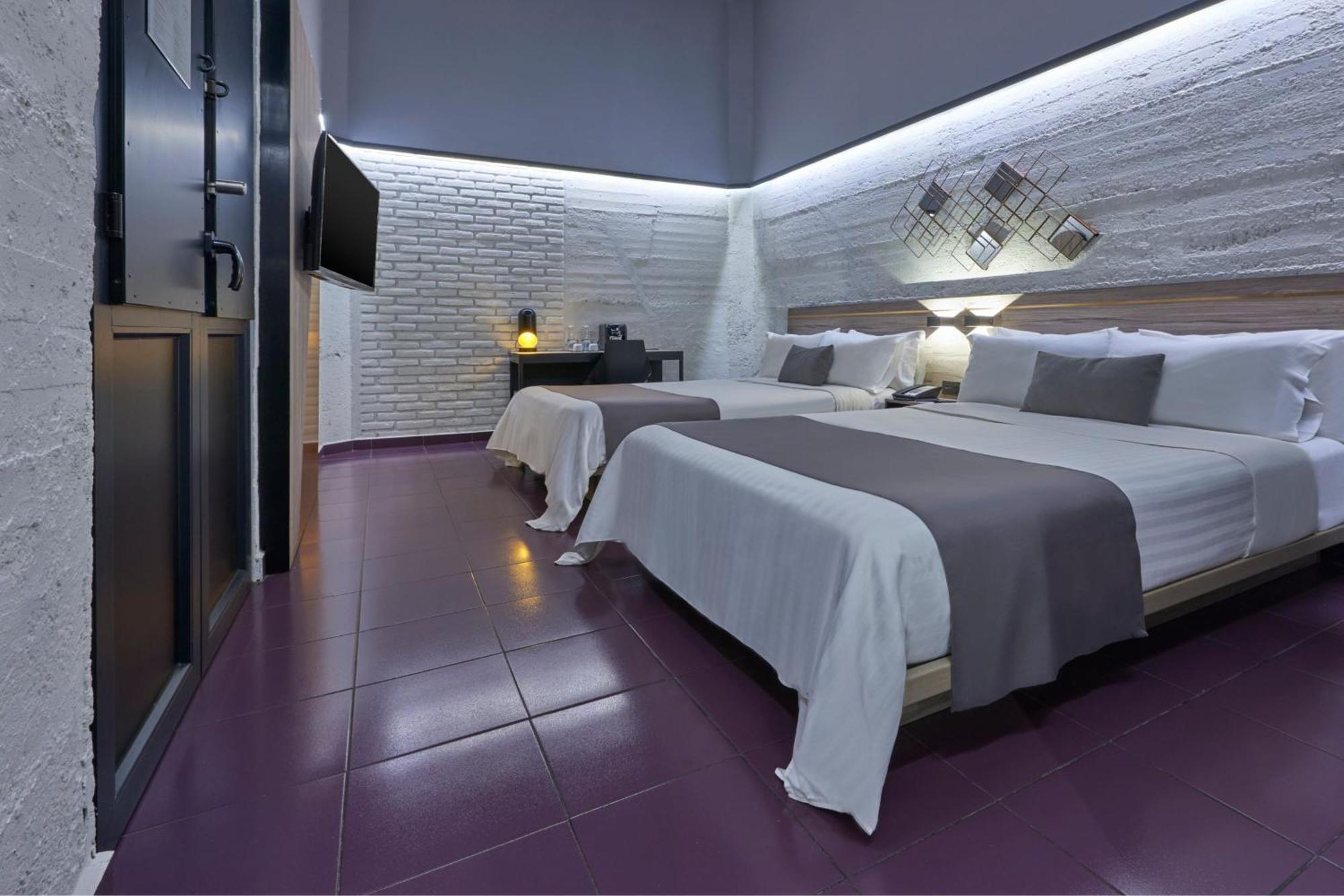 Kamer met 2 Queensize Bedden