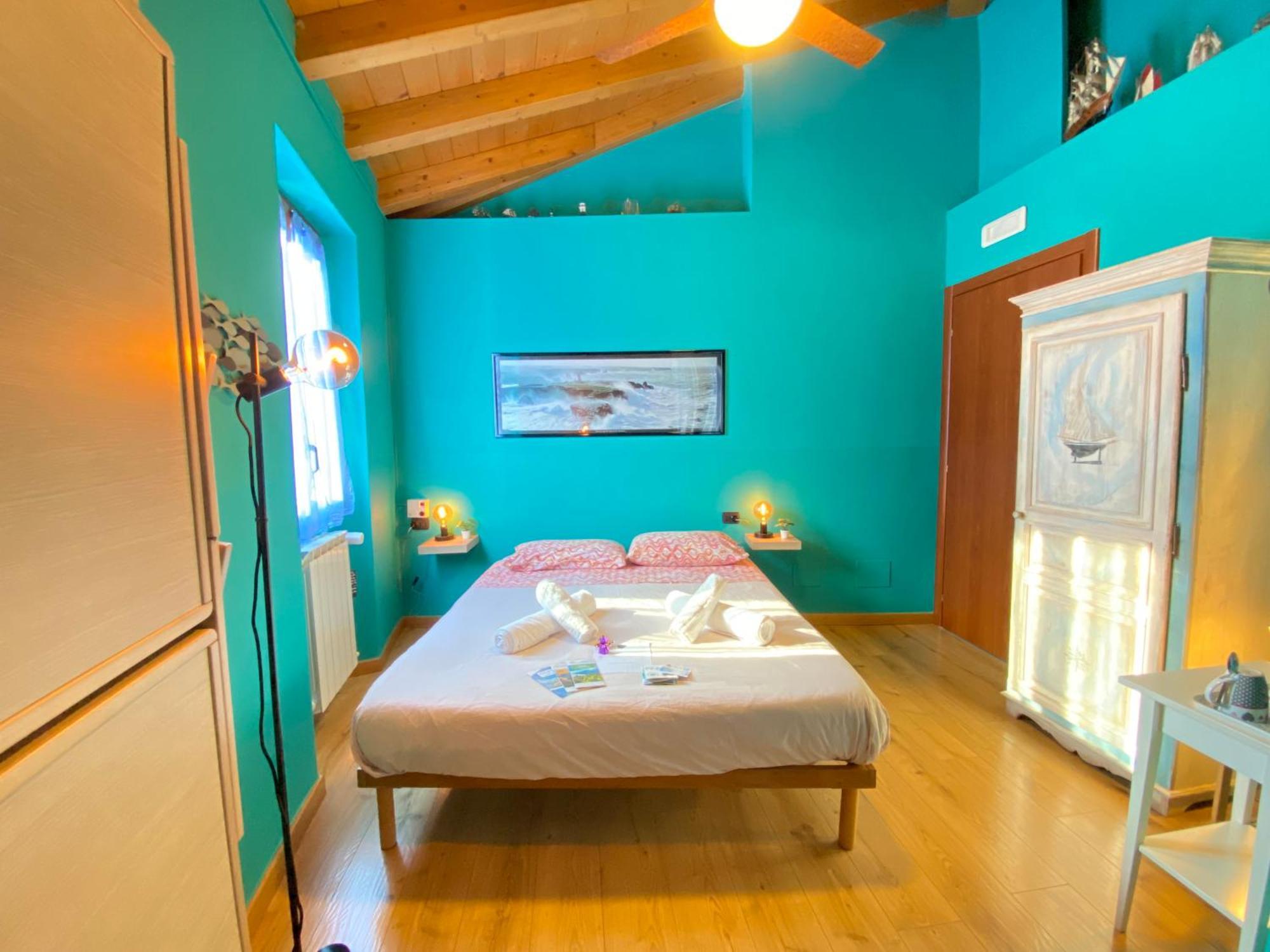 Camera Matrimoniale con Letto Supplementare