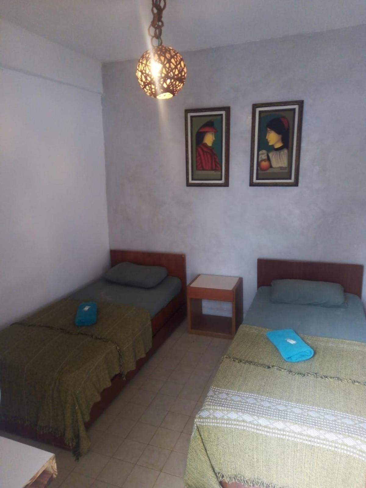 Quarto Individual com Varanda