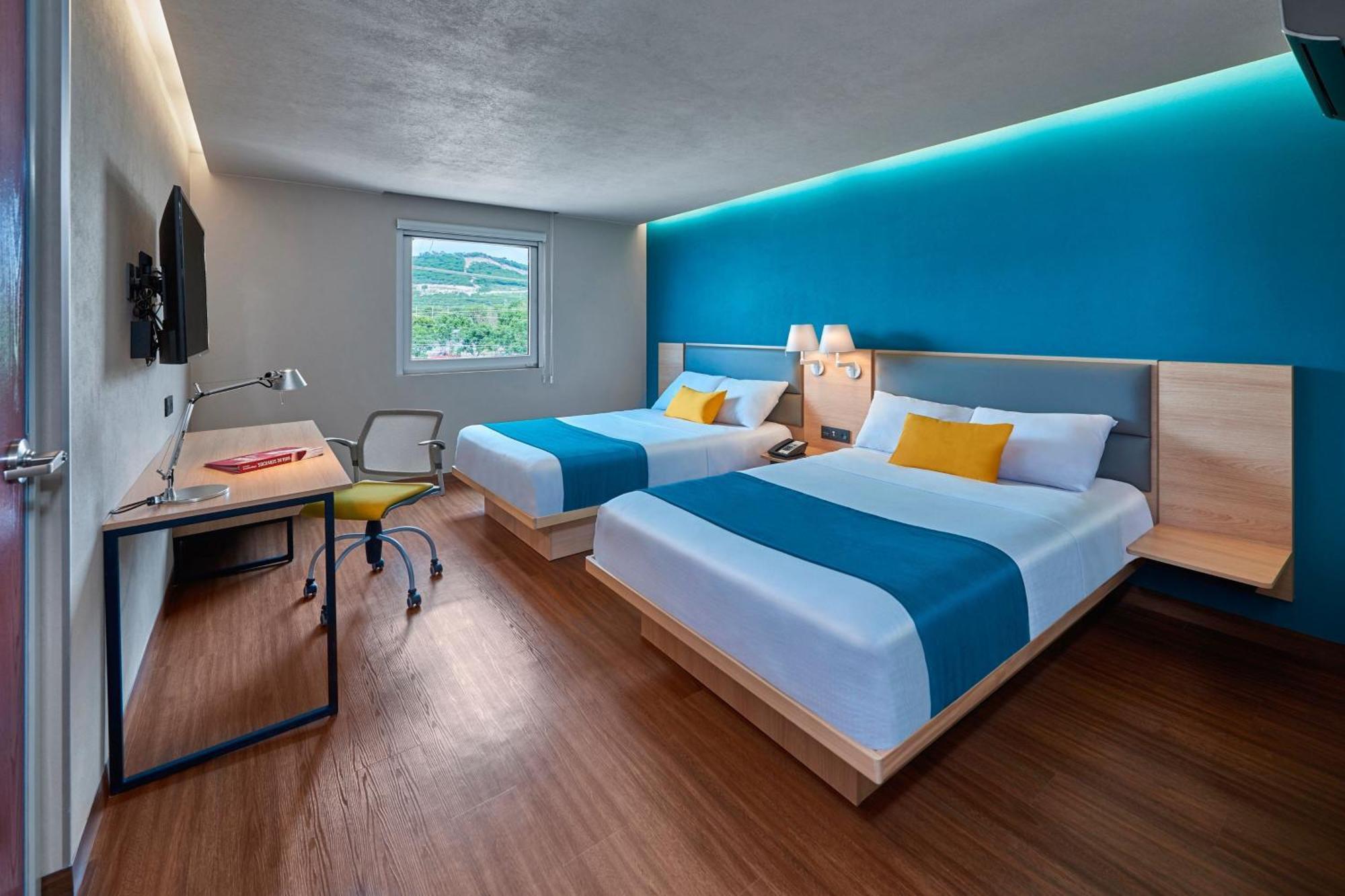 Suite Double avec 2 Lits Doubles et Canapé-Lit