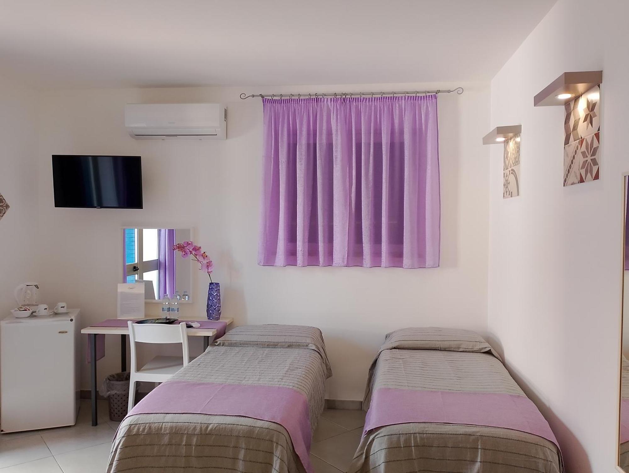 Comfort Quadruple Room