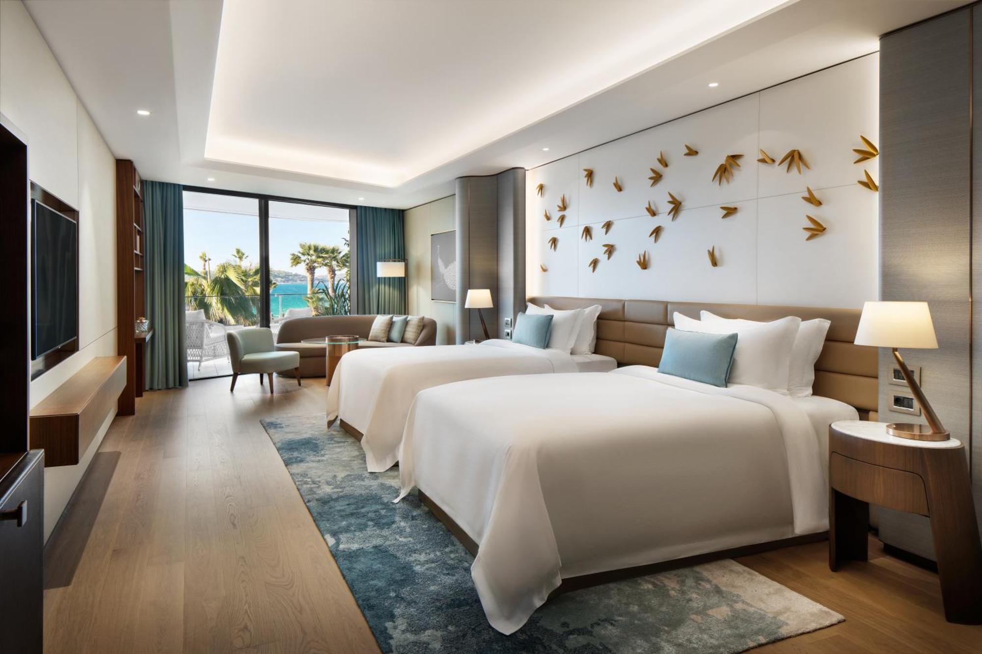 Reges Retreat Kamer met 2 Tweepersoonsbedden en Balkon - Uitzicht op Zee