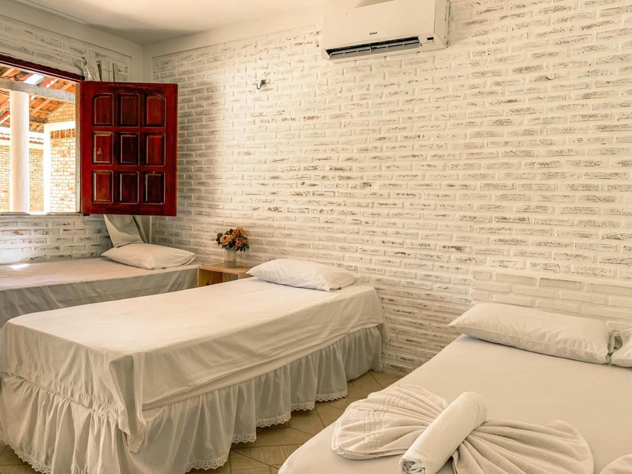 Quarto Quádruplo com Varanda