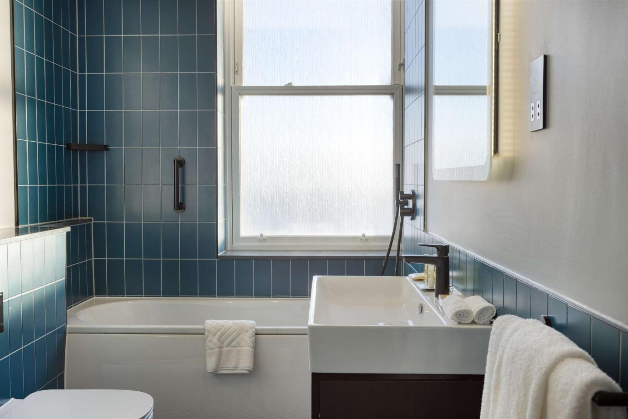 Suite met 1 Slaapkamer - Kingsize Bed - Uitzicht op Zee
