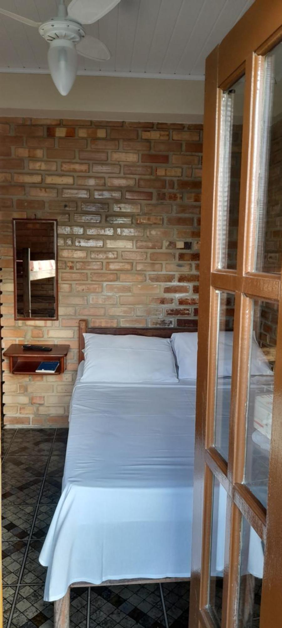 Quarto Quádruplo com Vista do Mar e Ventilador