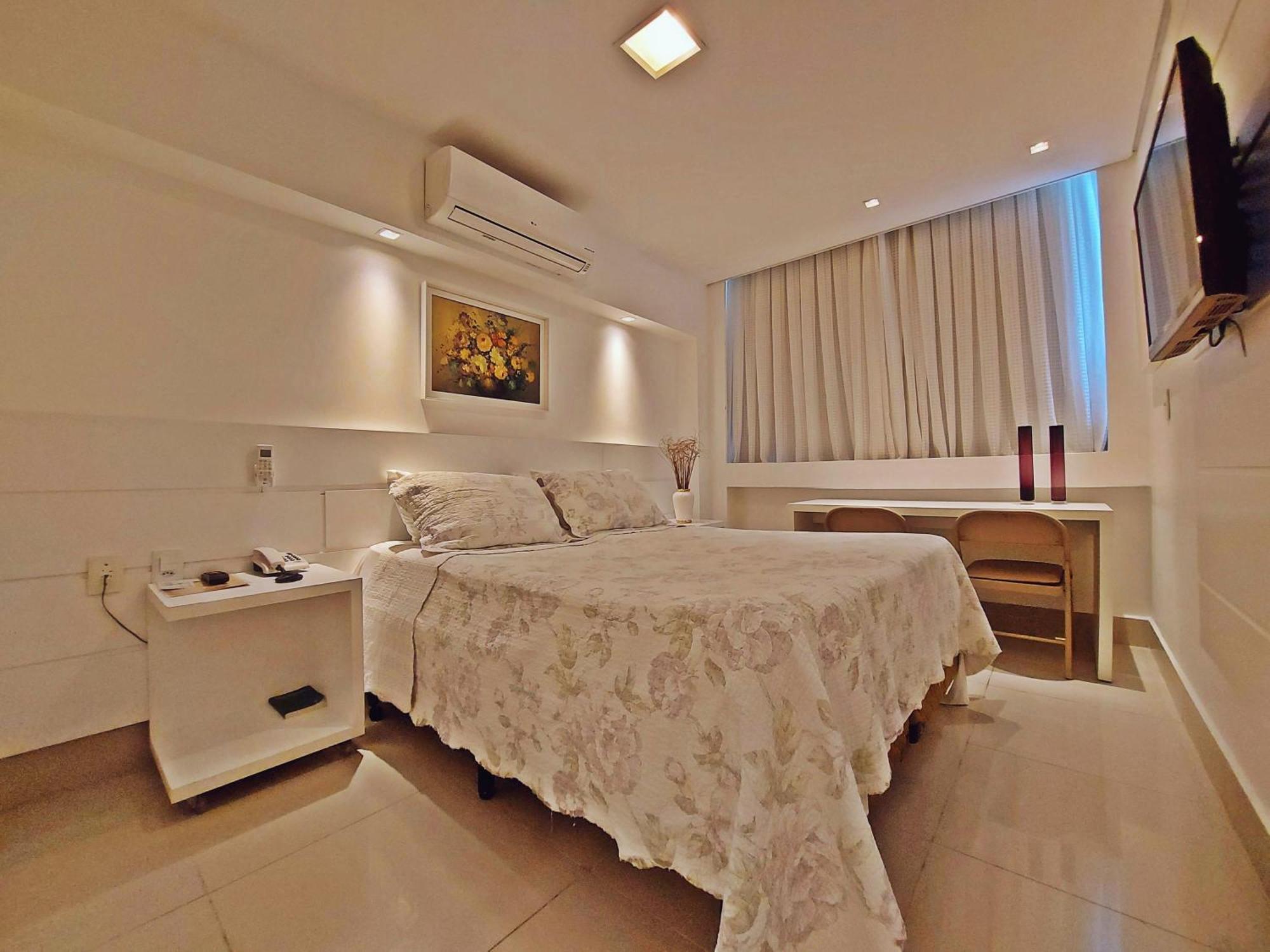 Quarto Deluxe (2 Adultos + 1 Criança)