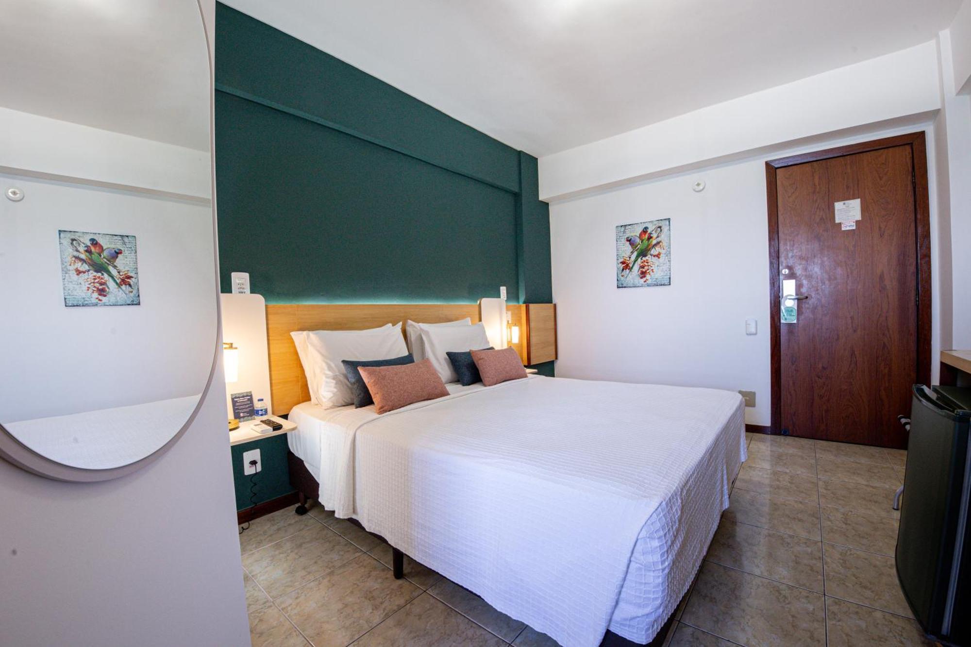 Quarto Triplo Deluxe com Vista Mar