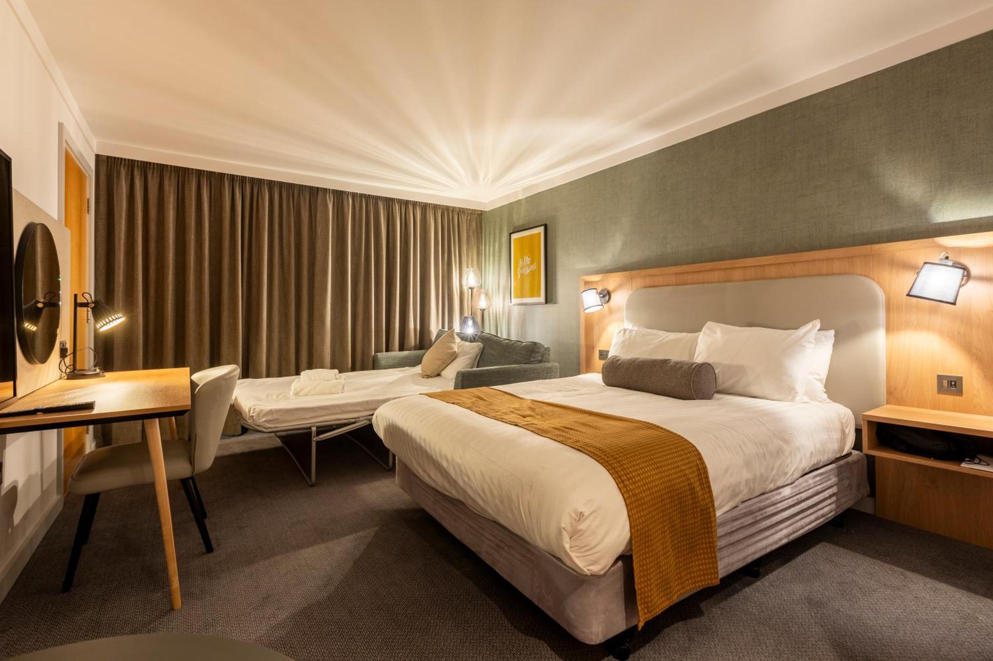 Kamer met Kingsize Bed en Slaapbank