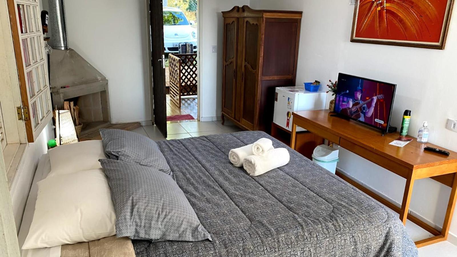 Quarto Triplo com Vista para a Montanha