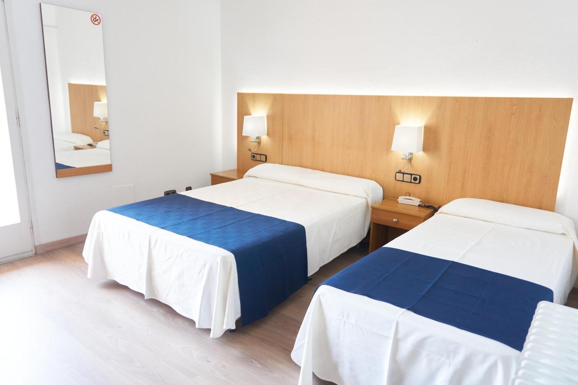 Chambre Triple (2 Adultes & 1 Enfant)