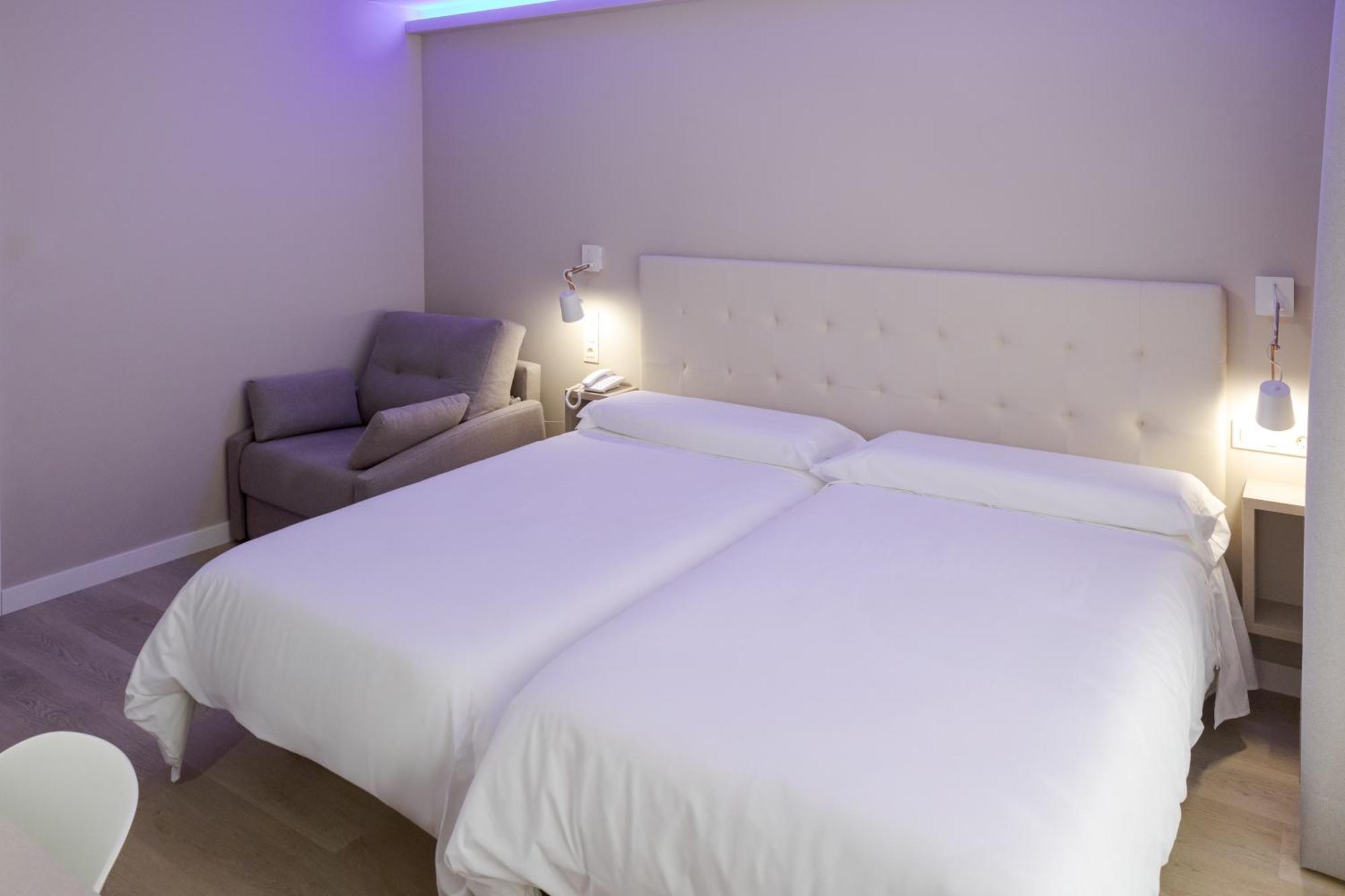 Habitación Triple Confort con ducha